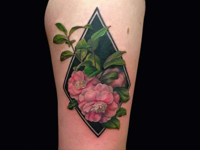 three roses on a vine at butter fat studios tattoo shop in Chicago