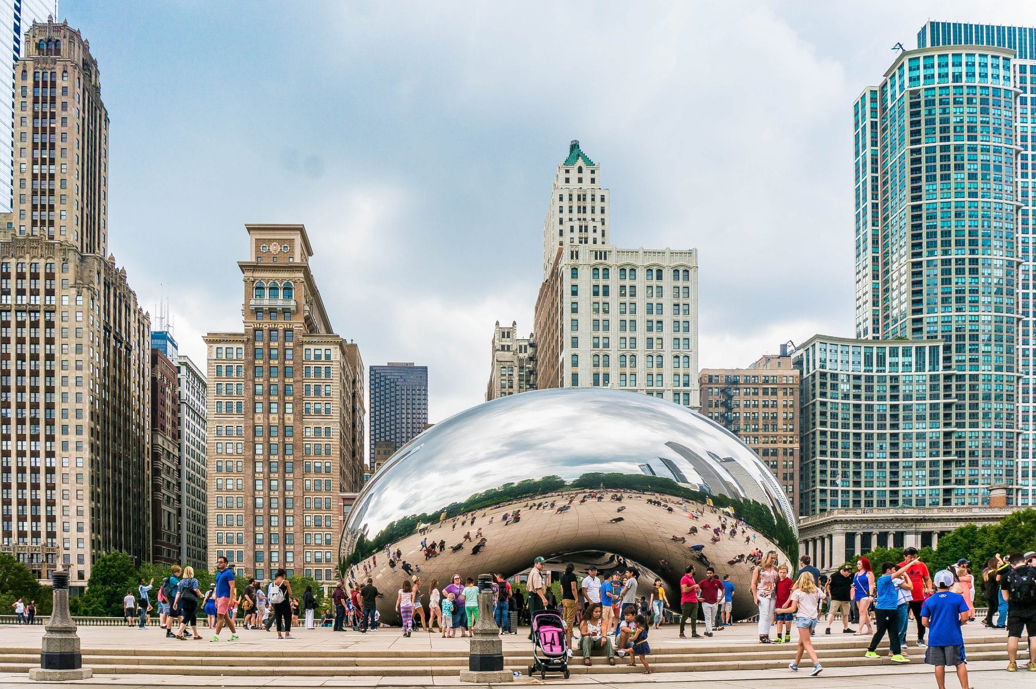 The Bean sculpture set against the city of Chicago