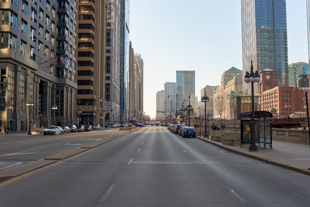 streets of Chicago at daytime. Chicago, colloquially known as the "Windy City", is the third most populous city in the USA, following New York and Los Angeles