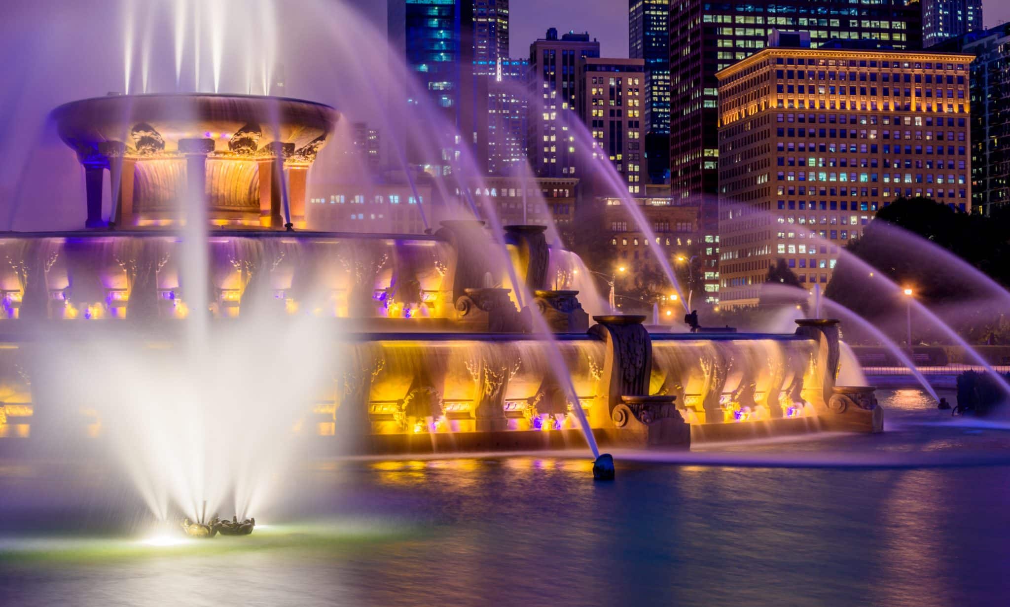 Buckingham Fountain Chicago lit up during summer