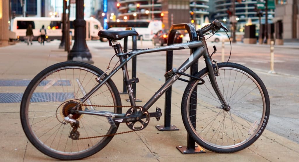 Bike leaning against a bike rack