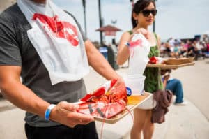 Image showing two people with food from the Great American Lobster Fest in Chicago