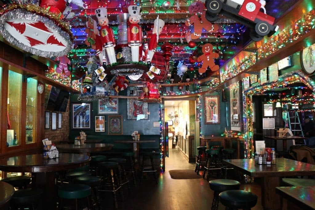 Interior of a bar decked out in Christmas decor