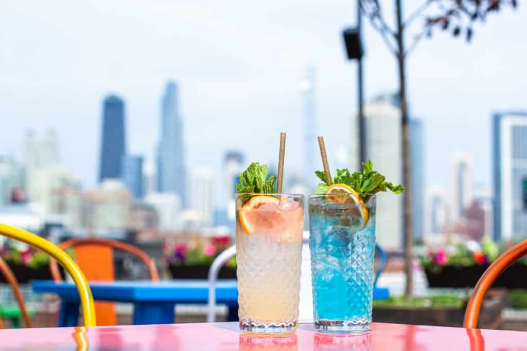 Drinks on a table set against the Chicago skyline