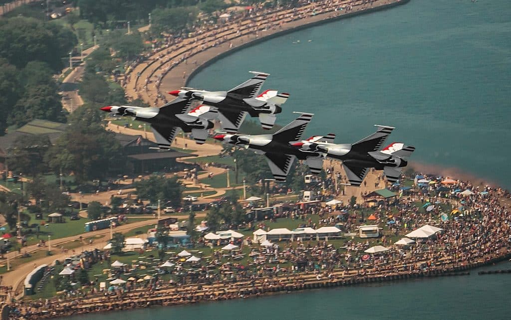 Image showing The U.S. Air Force Thunderbirds flying over North Avenue Beach in Chicago during a performance at the Chicago Air & Water Show