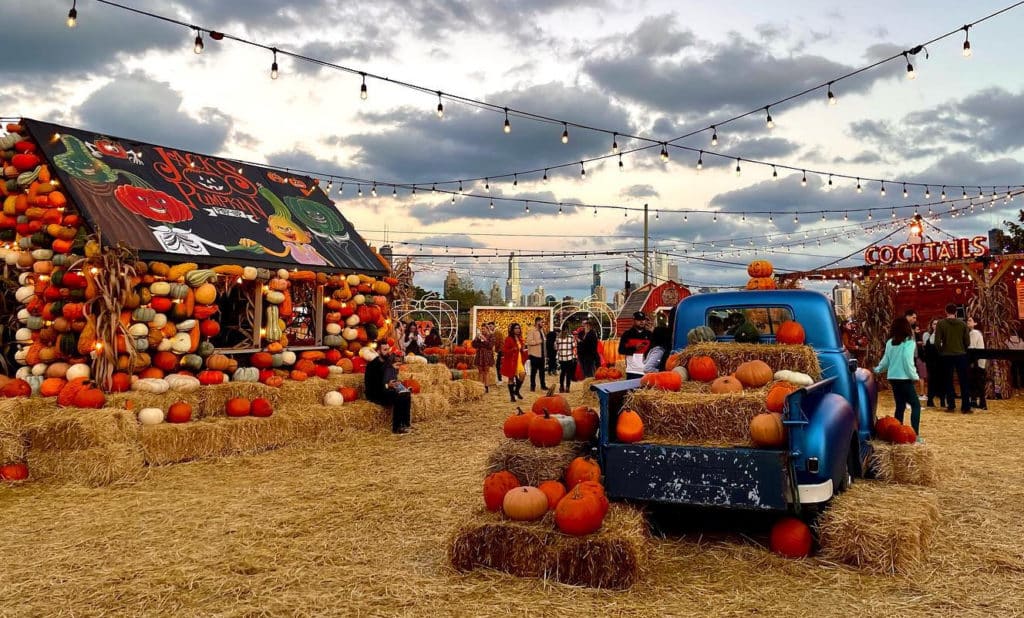 pumpkins, hay seats and fall decorations at Jack's Pumpkin Patch Pop Up in Chicago