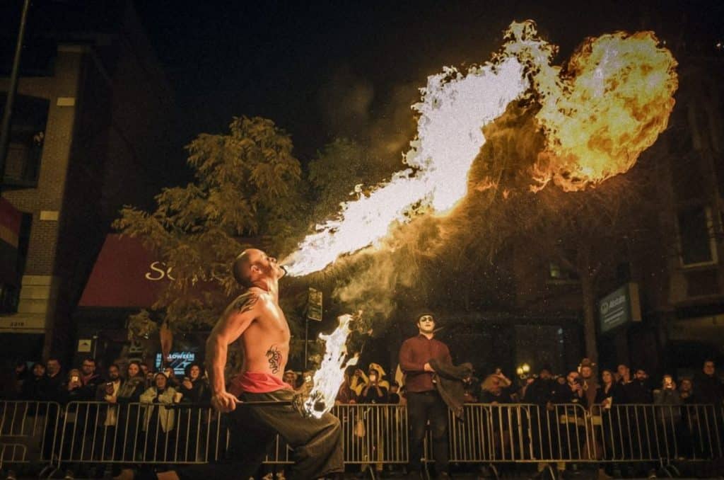 Person doing fire tricks at the parade