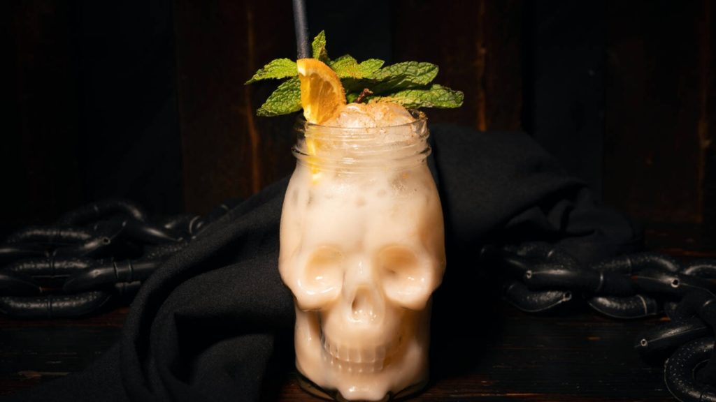 Drink seen in a skull shaped glass