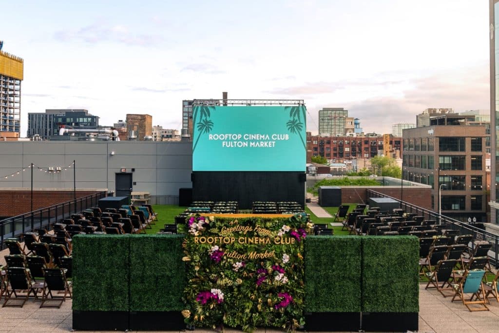 View of the Rooftop Cinema Club setup and movie screen