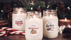 Festive holiday candles featuring peppermint, gingerbread, and hot coco scents