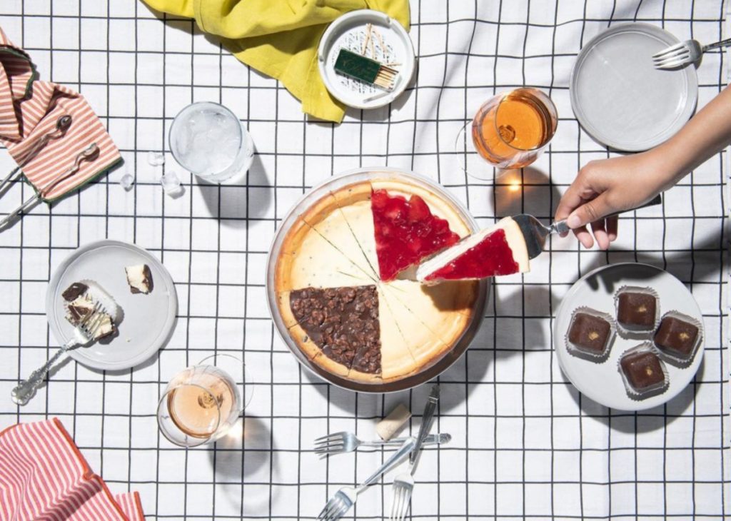 Chees cake spread on a patterned table cloth