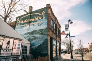 Exterior of FitzGerald's features a colorful mural and brick