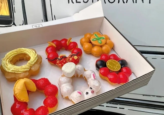 Mochi donuts pictured in a box