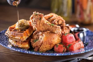 Yardbird food: chicken and waffles pictured