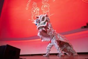 Lunar New Year celebration on stage shows statue