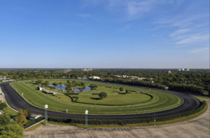 Arlington Race track pictured with course surrounded by greenery 