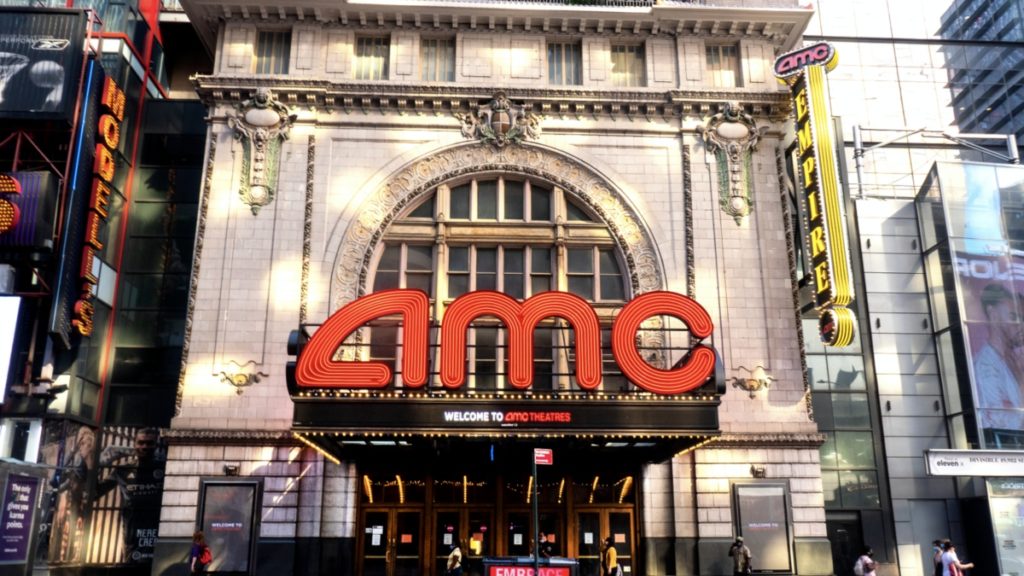 AMC theater marquee pictured on a New York City building