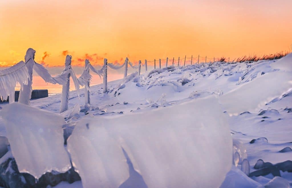Chicago beach pictured covered in icicles.