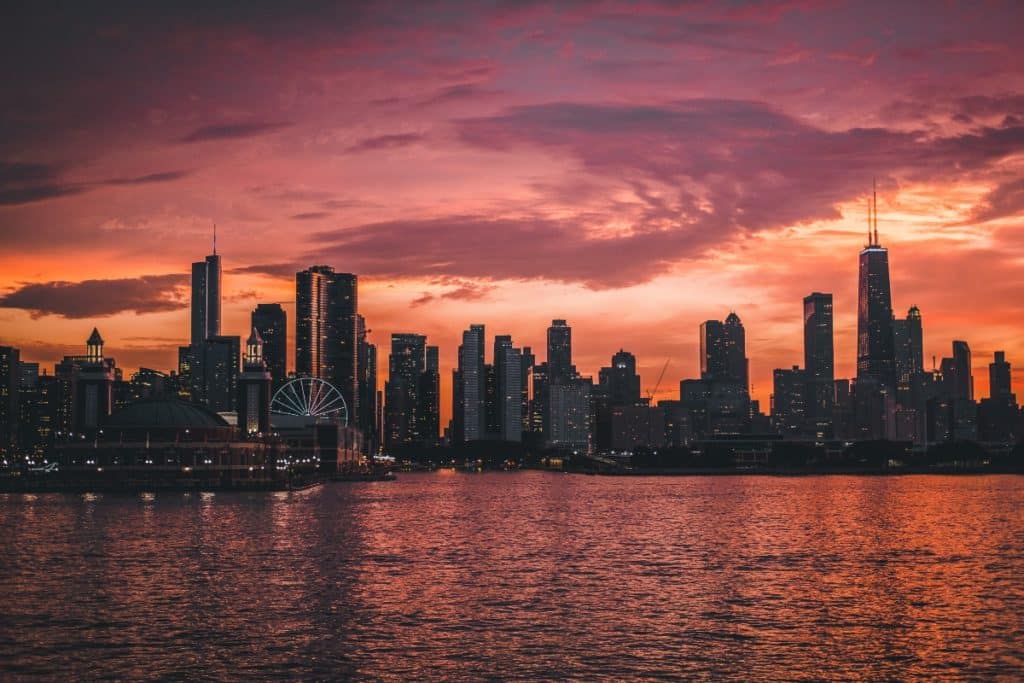 Chicago skyline pictured against a sunset