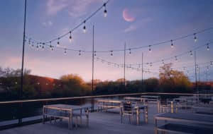 Image showing Metropolitan Brewing's riverside patio seating outside its craft beer taproom