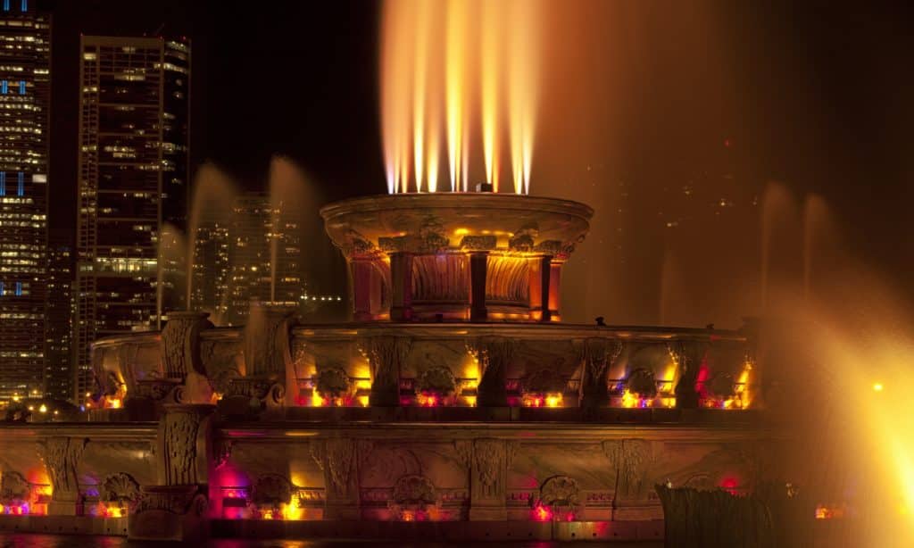 Photo of Chicago's Buckingham Fountain illuminated at night during a water, light and music evening show