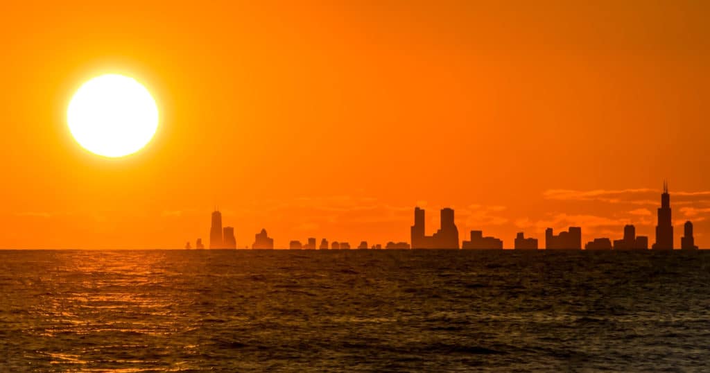 Image showing the sun setting over Chicago and Lake Michigan