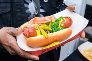 A hotdog pictured with typical Chicago toppings