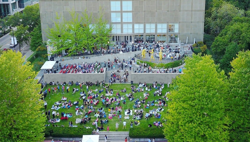 people gathered and listening to music for a Tuesdays on the Terrace at the Chicago Museum of Contemporary Art