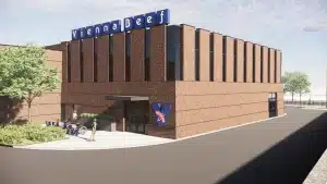 Vienna Beef HQ rendering shows a large building, parking space and a Vienna Beef sign