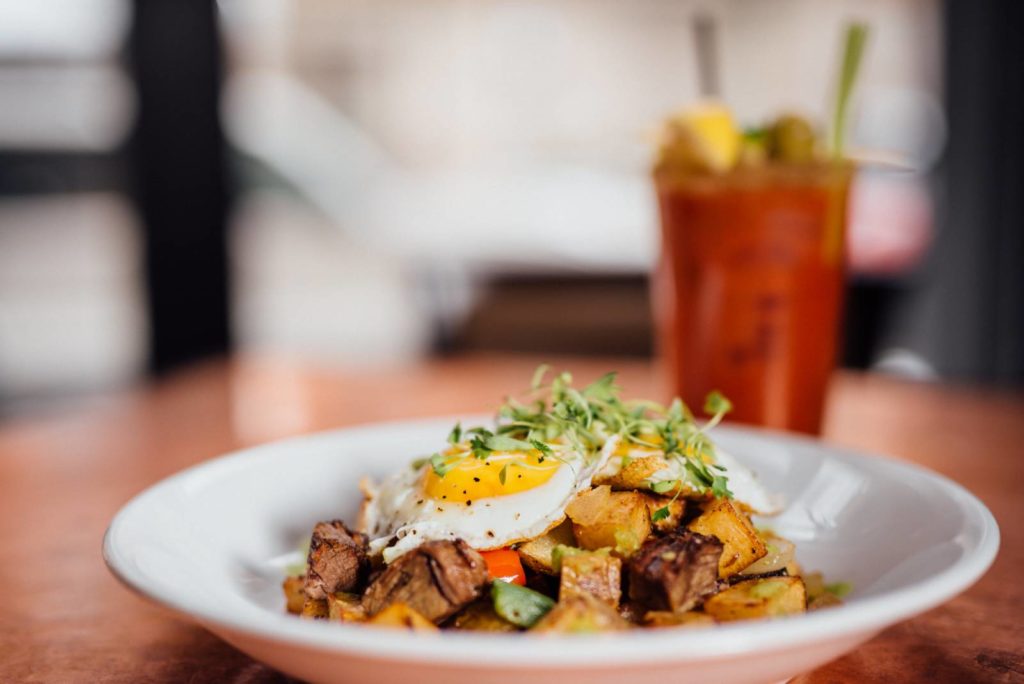 This Upscale Sports Bar Has A Decadent Brunch, Trivia Nights, And 90 Craft Beers On Tap