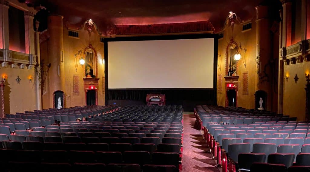 Image showing the 70mm screen at Chicago's Music Box Theatre in preparation for a special Oppenheimer viewing.