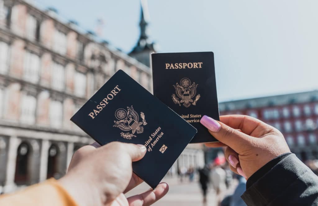 Image showing people holding United States passports in Spain