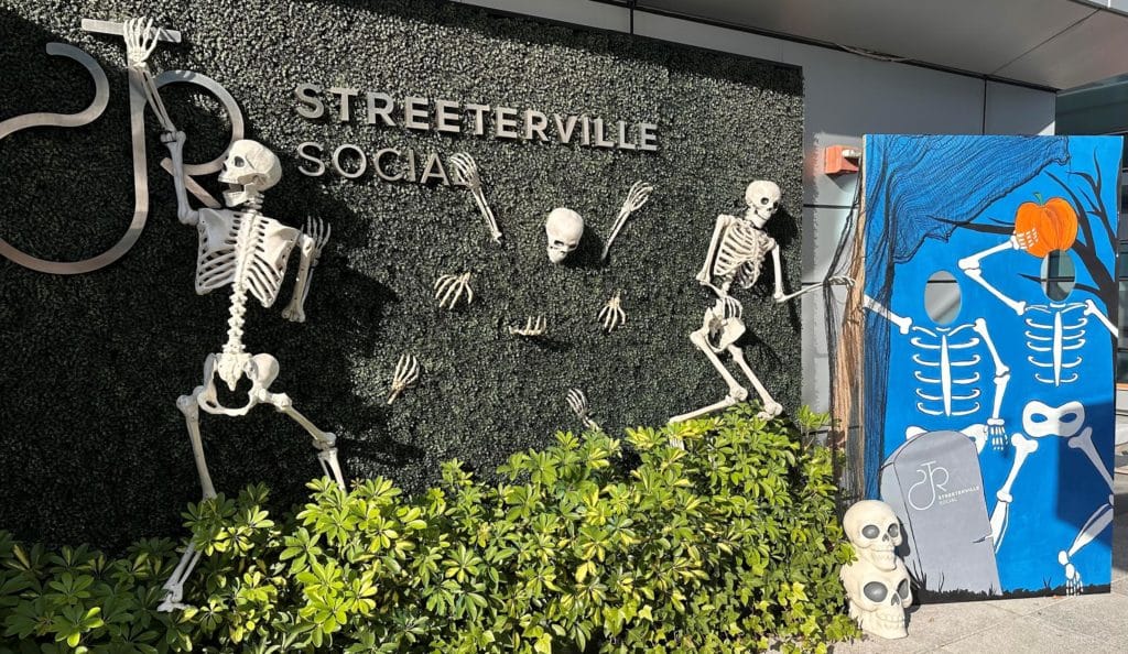 skeletons next to the streeterville and on the grass wall at streeterville social