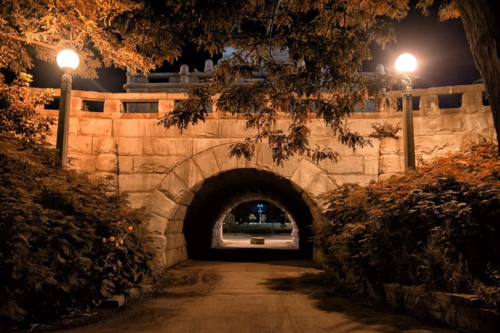 Vintage stone bridge and tunnel in Chicago's Lincoln Park at night
