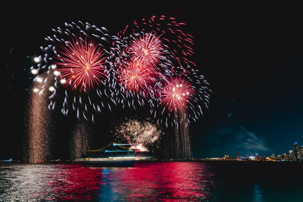 Chicago, IL, Navy Pier Fireworks over a river cruise